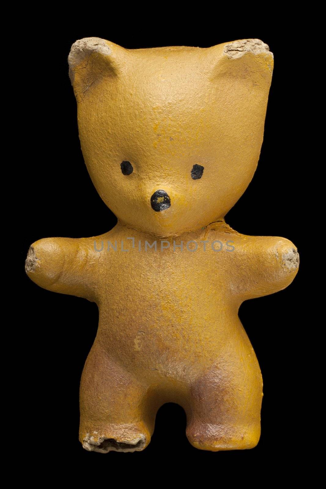 Old yellow teddy bear by andrius