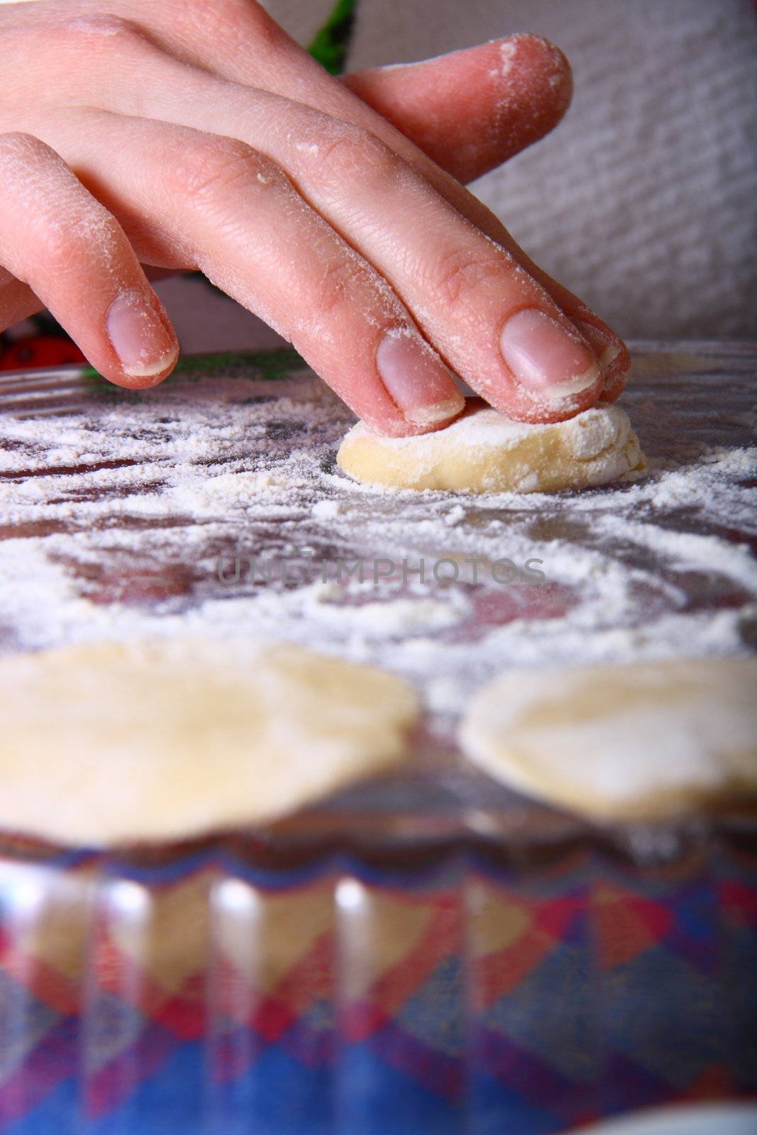 hand made ravioli getting prepared on table 