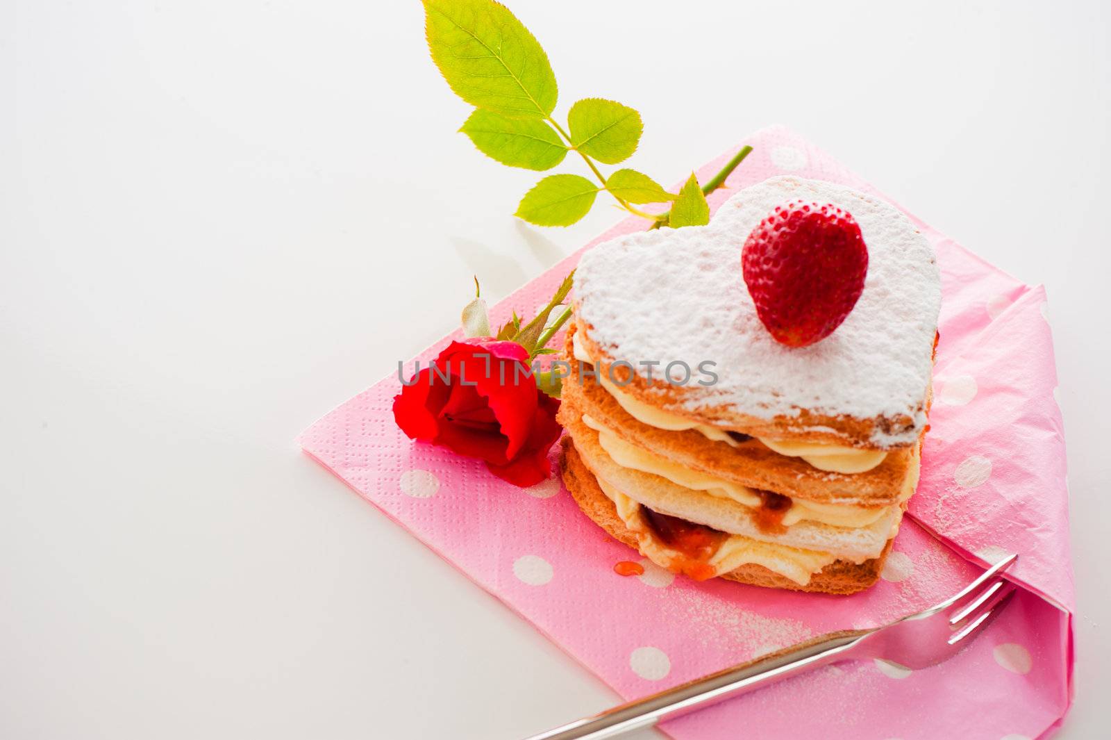 Beautiful decorated cake, heart with strawberry