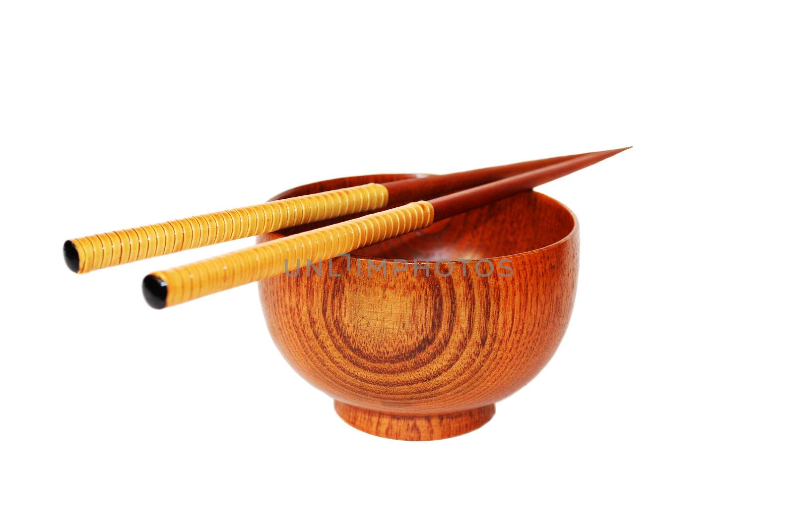 Chopsticks with wooden bowl isolated on white 