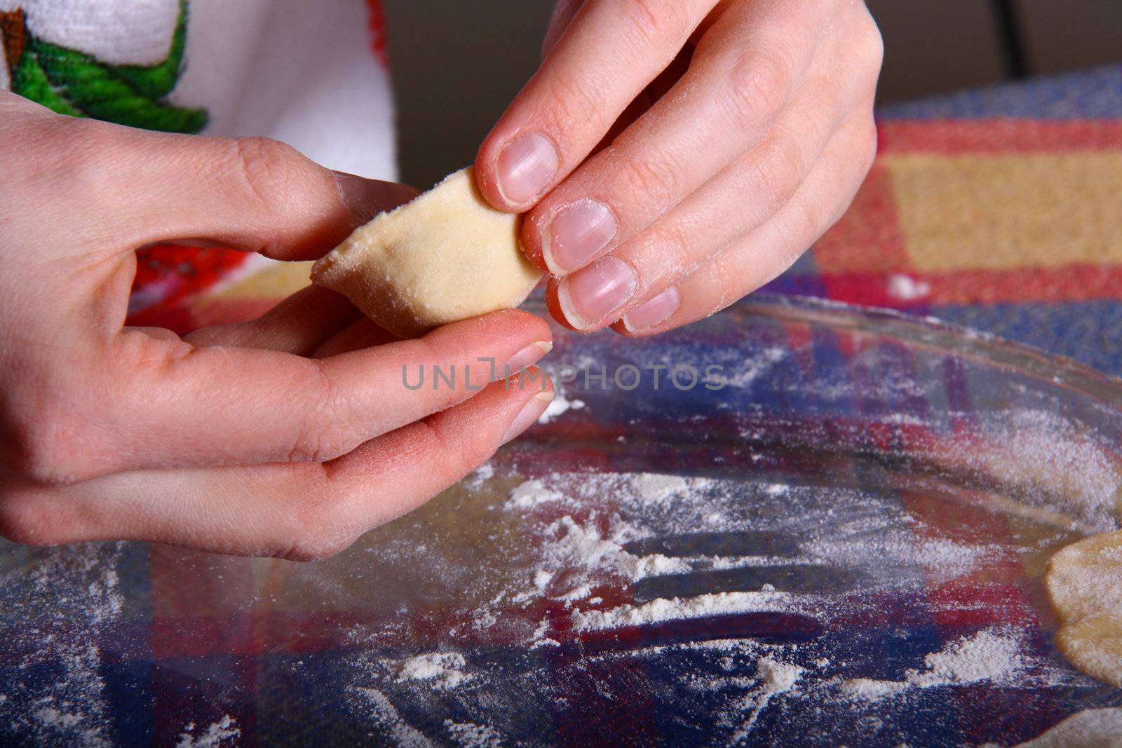 hand made ravioli getting prepared on table 