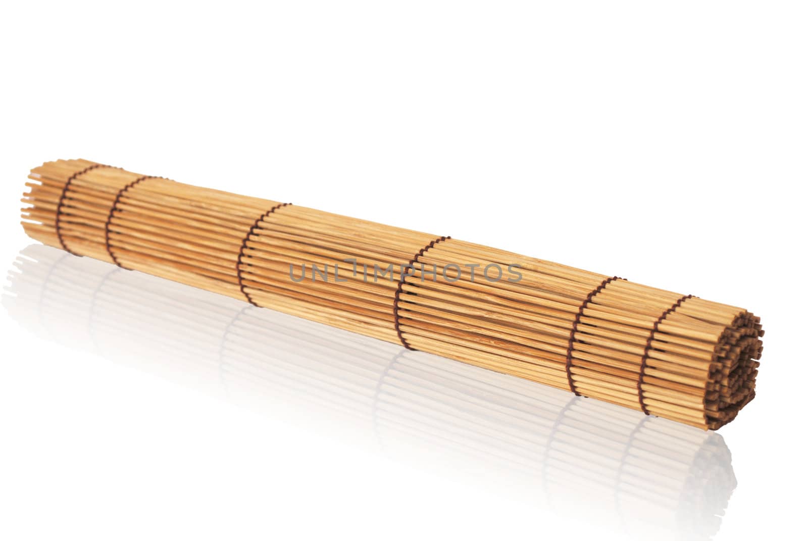rolled bamboo mat on a white background                