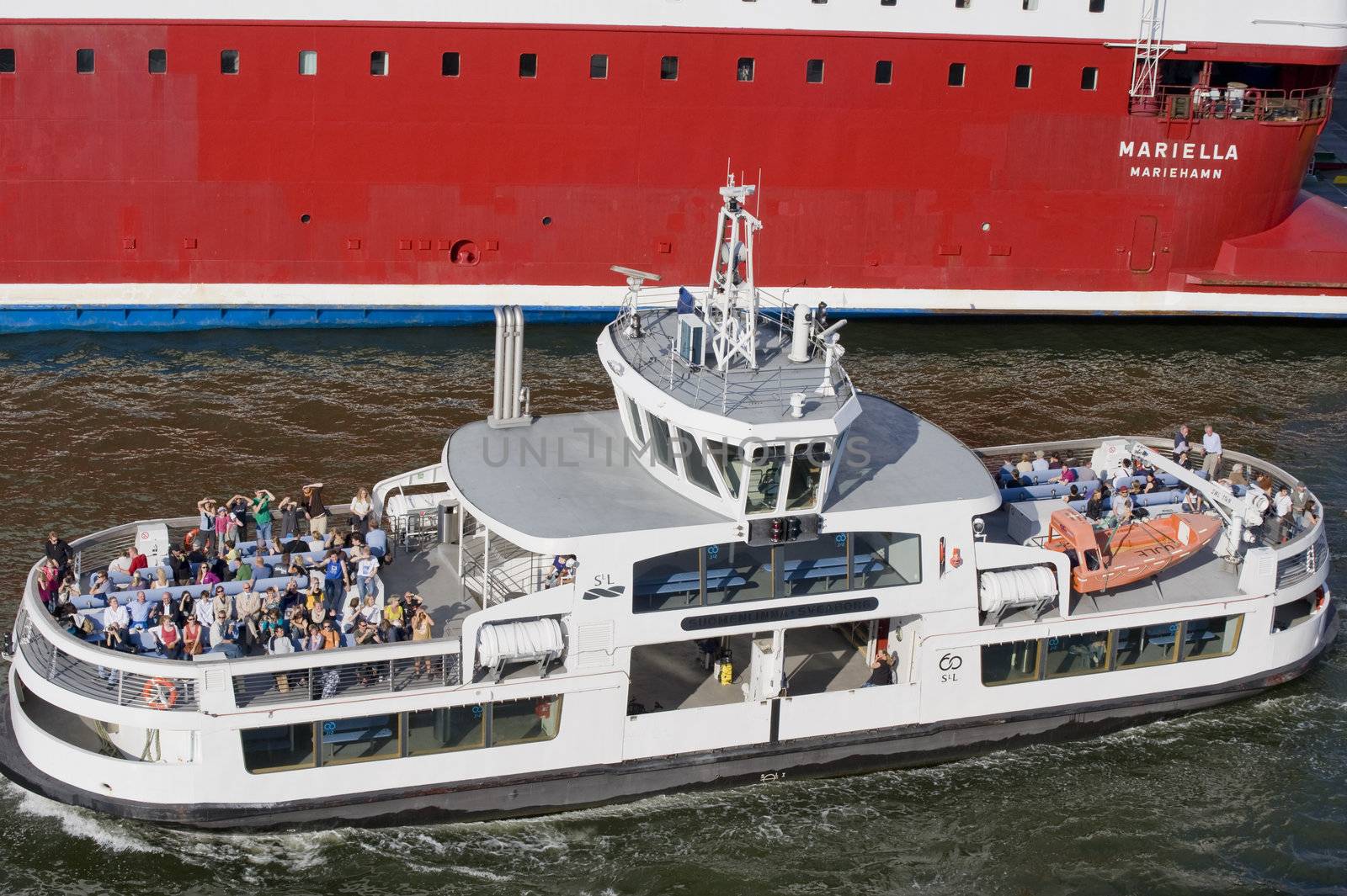 Small cruise boat in the Helsinki harbor, Finland