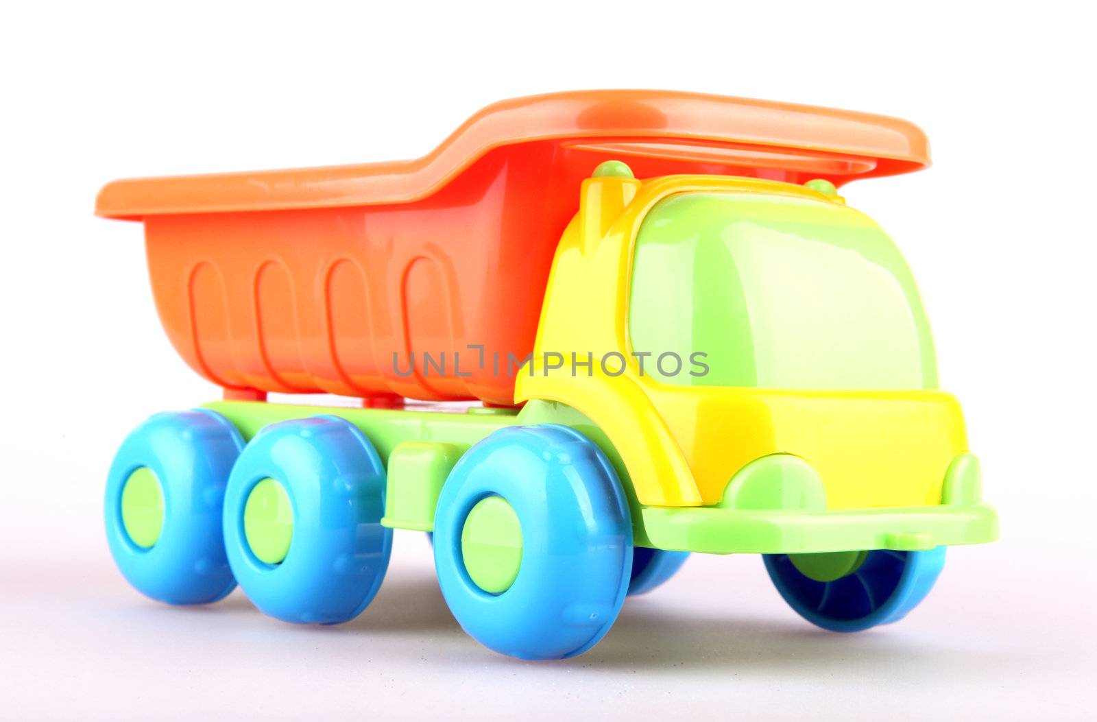 Colorful toy truck isolated on white background