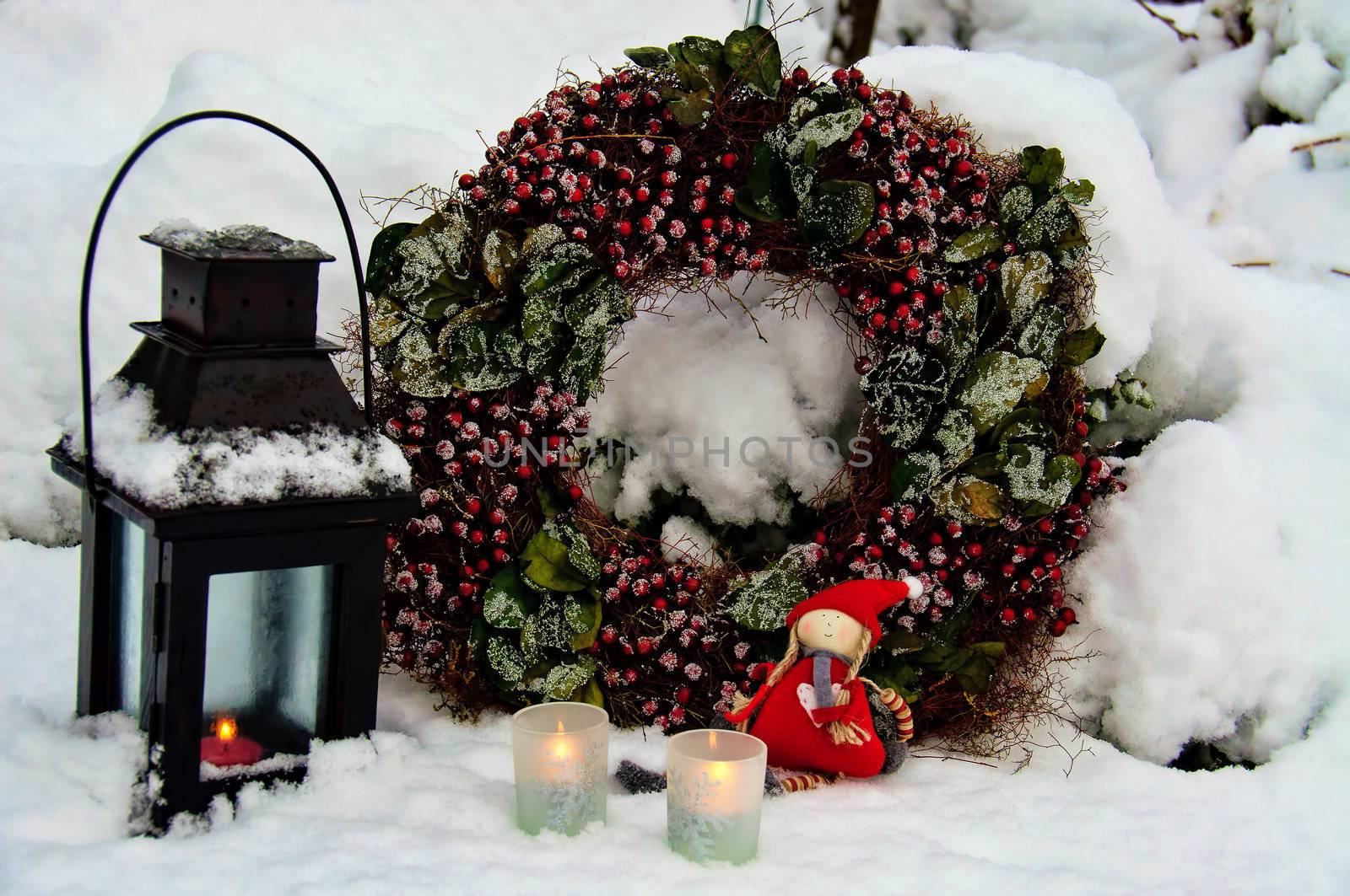 Christmas decoration for the garden with candlelight and wreath