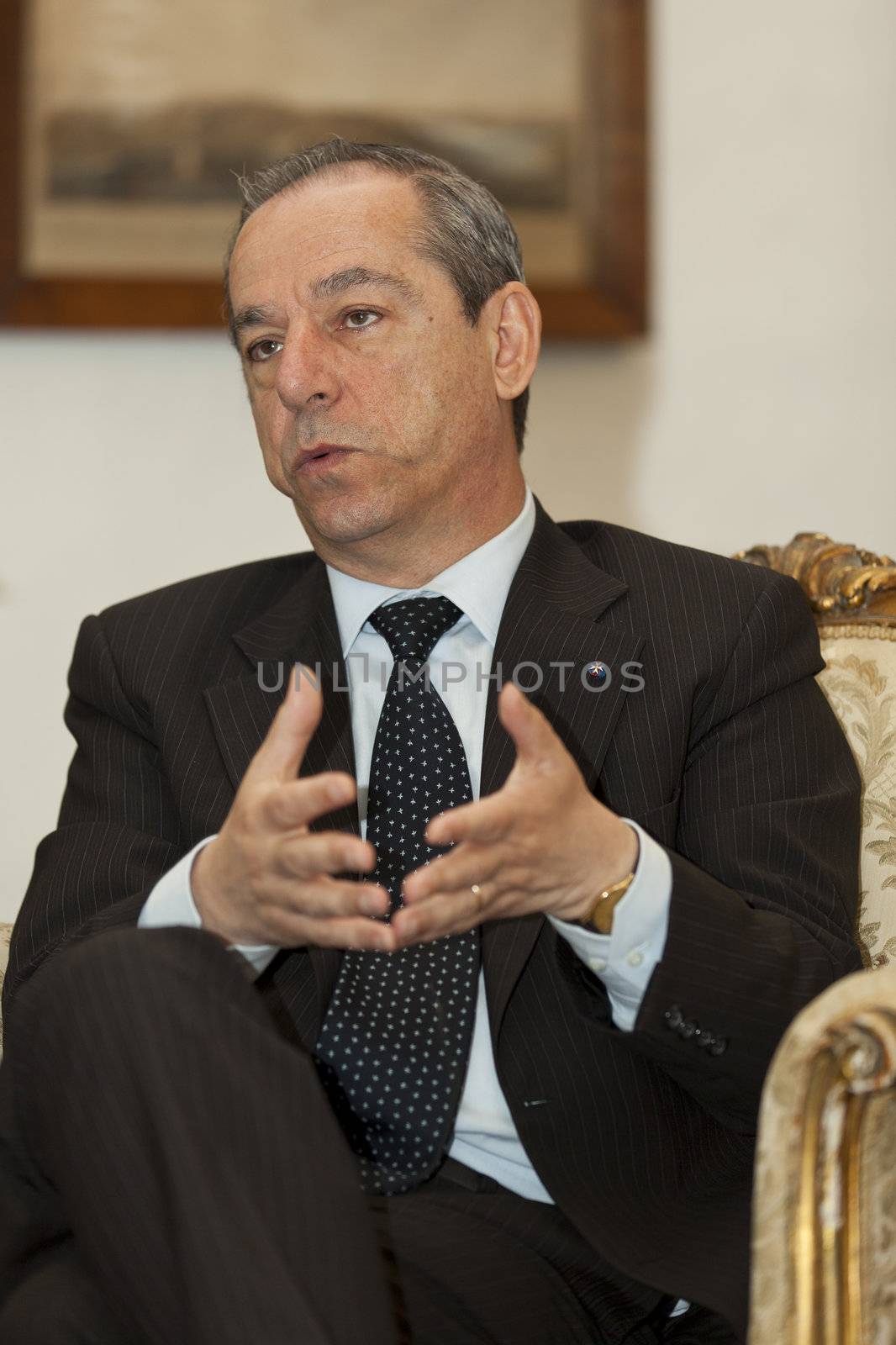OPM, AUBERGE DE CASTILLE, VALLETTA, MALTA - MAY 12 - The Prime Minister of Malta, Dr. Lawrence Gonzi, with reporters from The Report Company in partnership with of Guardian News and Media UK on 12 May 2011.
