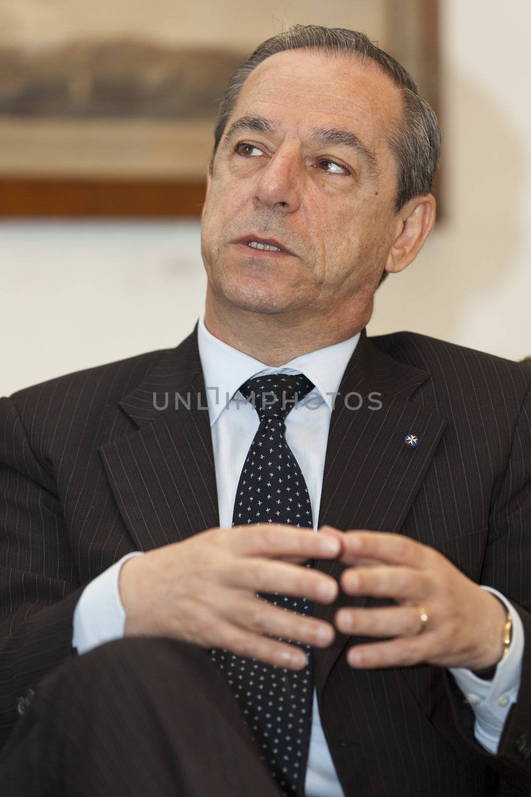 OPM, AUBERGE DE CASTILLE, VALLETTA, MALTA - MAY 12 - The Prime Minister of Malta, Dr. Lawrence Gonzi, with reporters from The Report Company in partnership with of Guardian News and Media UK on 12 May 2011.