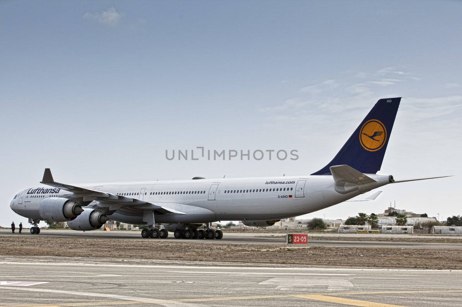 LUQA, MALTA - 25 SEP - Lufthansa A340 reg number D-AIHO rolls out of Lufthansa Technik hangar for trial flight on 25 September 2011