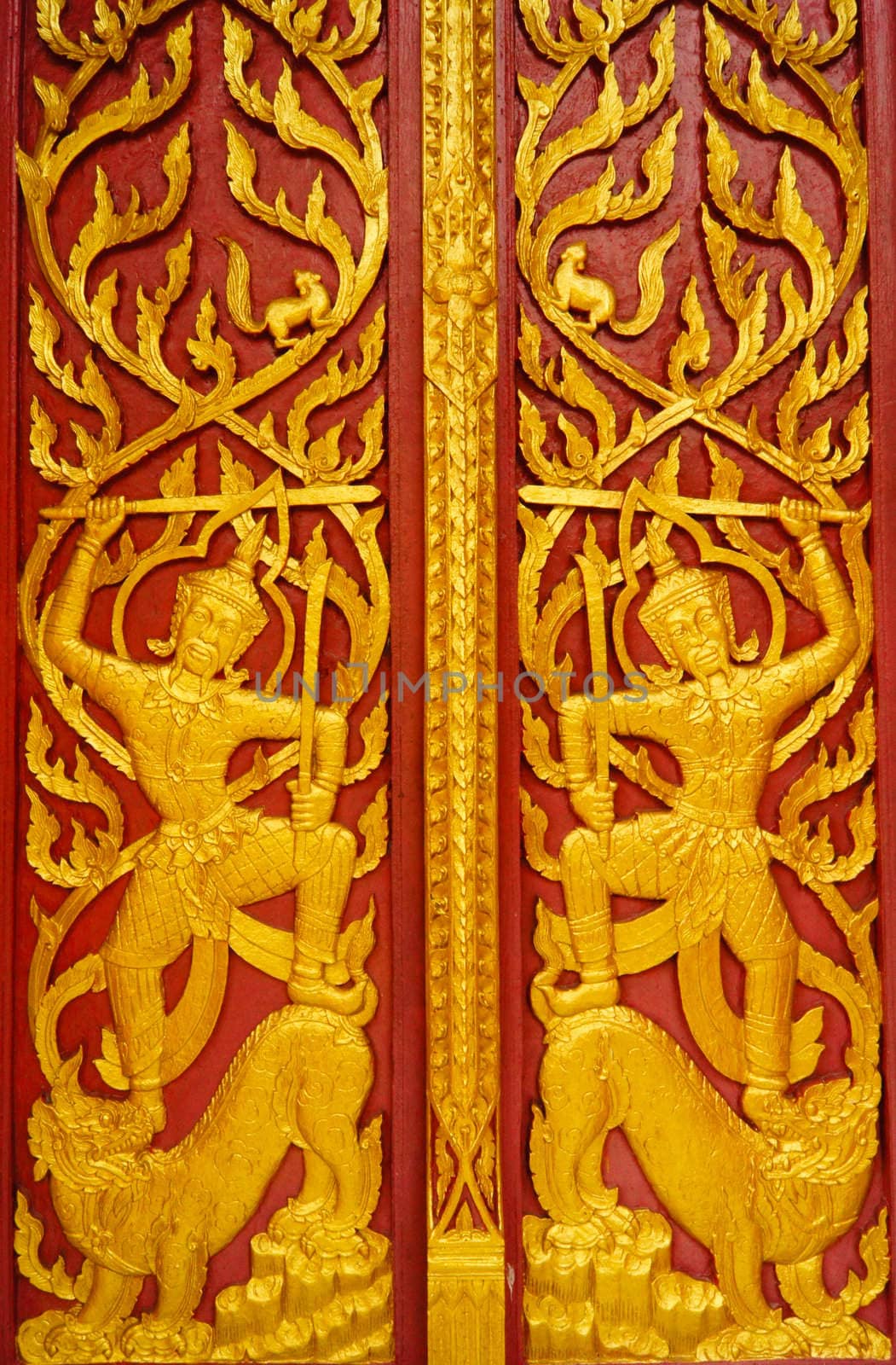 Gold carved ancient doors of  temple