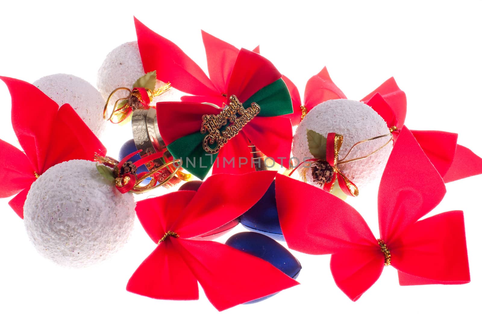 Christmas baubles and other decorations on a white background