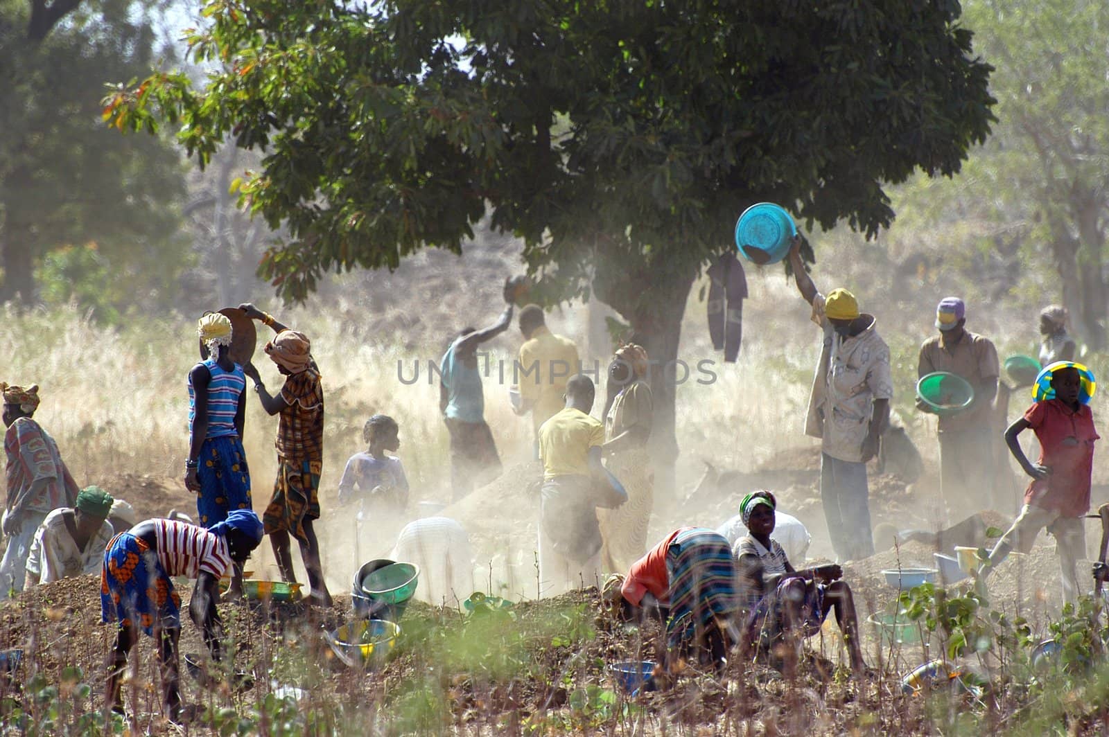 To the goldmine of Poura the gold diggers come from everywhere in the hope of finding a little gold after the season of the cultures. Women, children and men of very old are here in a universe of dust under a blazing sun. In Burkina Faso Faso the research of gold in the wild mines is the only activity which makes it possible to save the population of misery.                             