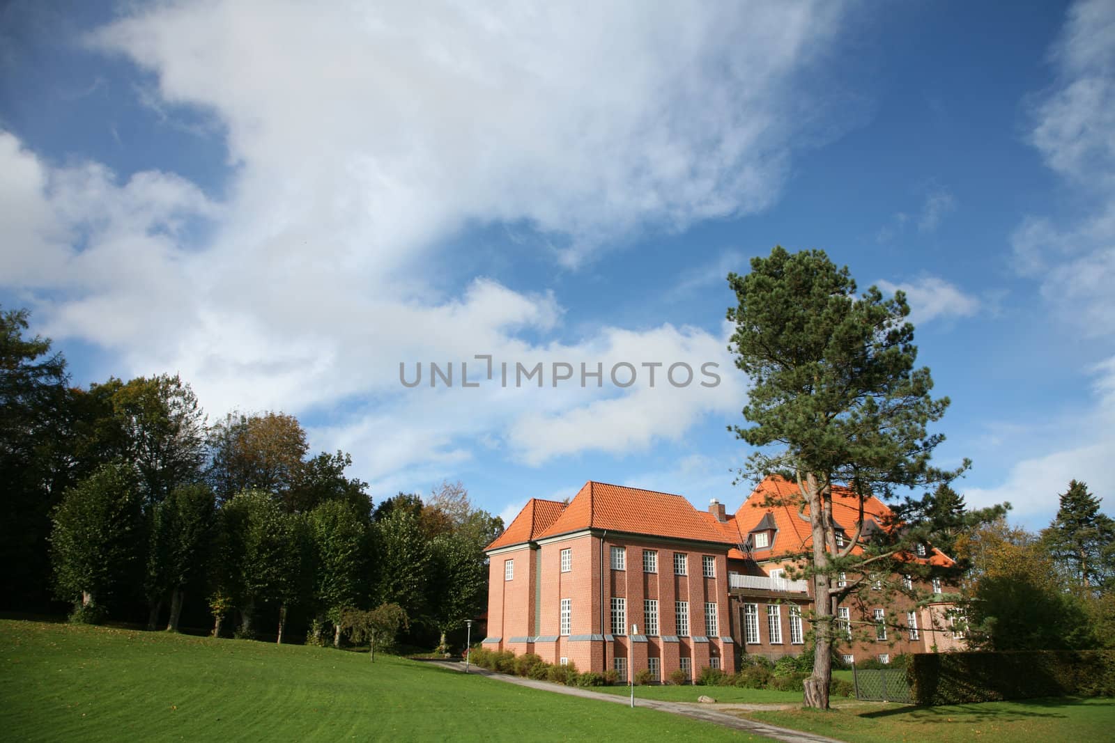 large  house  in brick with a park