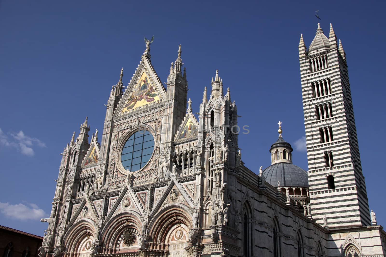 The magnificant cathedral of Siena (Duomo di Siena), shot in Siena, Italy.  The cathedral was constructed between 1215 and 1263.
