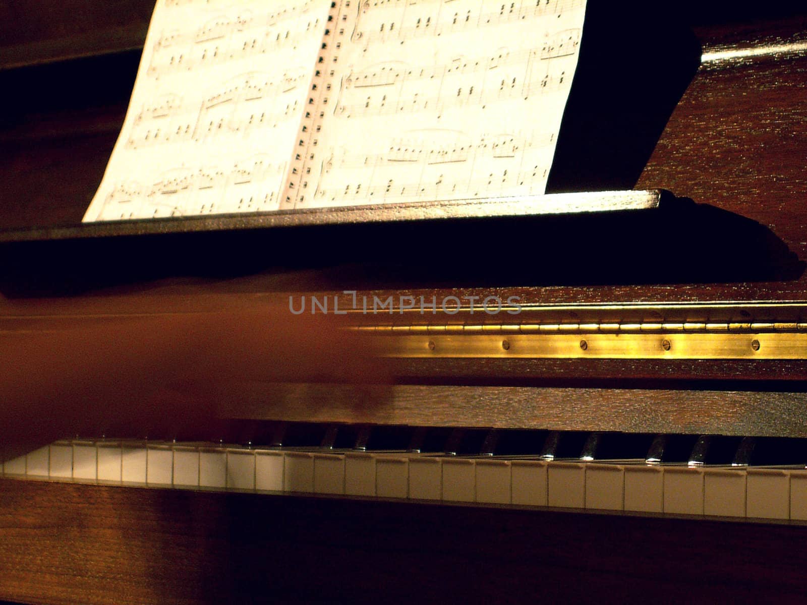 Hands in movement in the piano