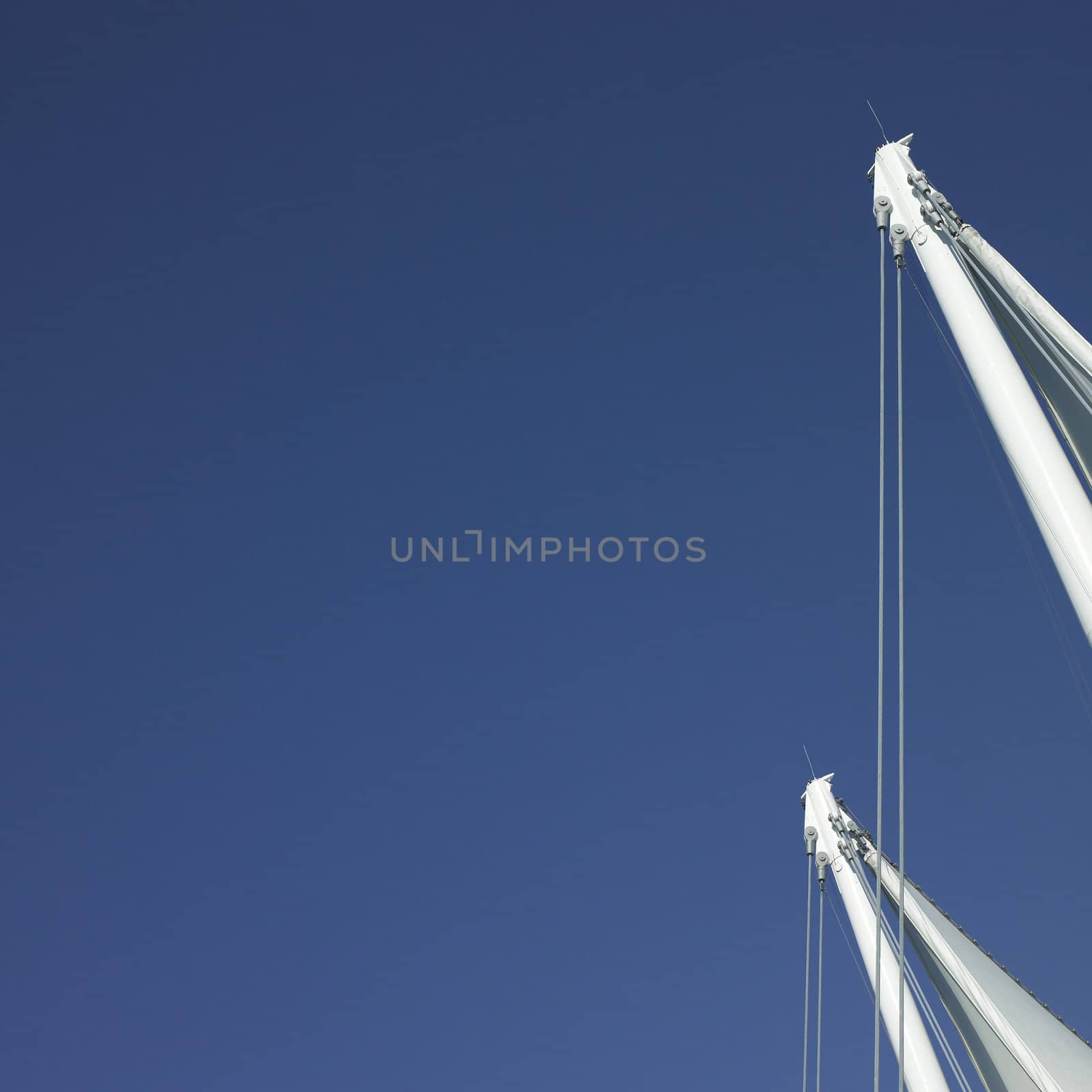 White sails and blue sky