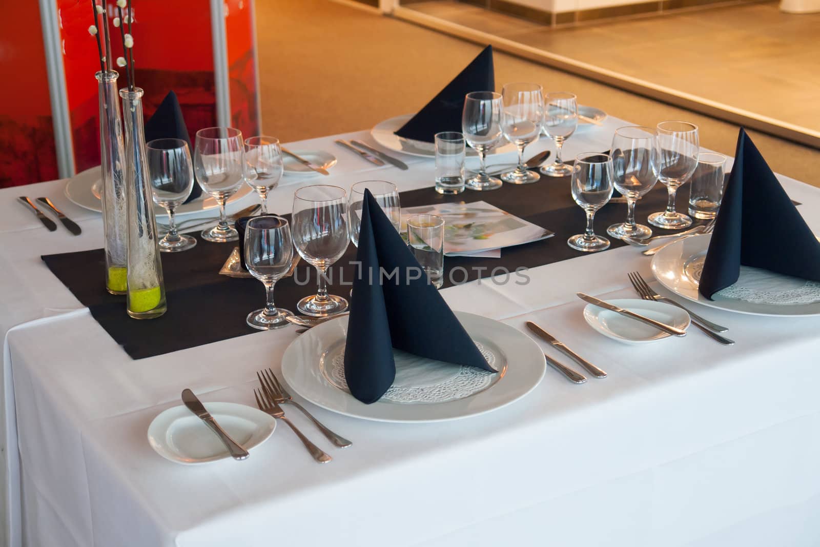 Fine restaurant beautiful dinner table place setting with classical decorative items