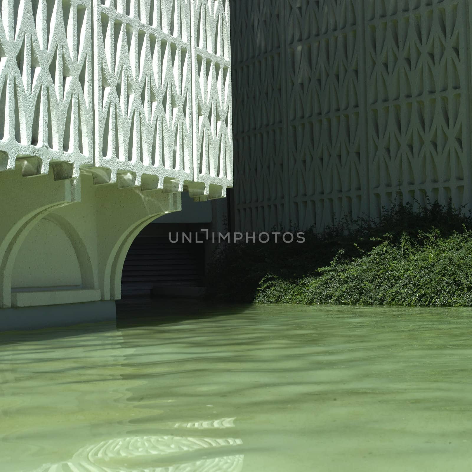 White patterned wall and water