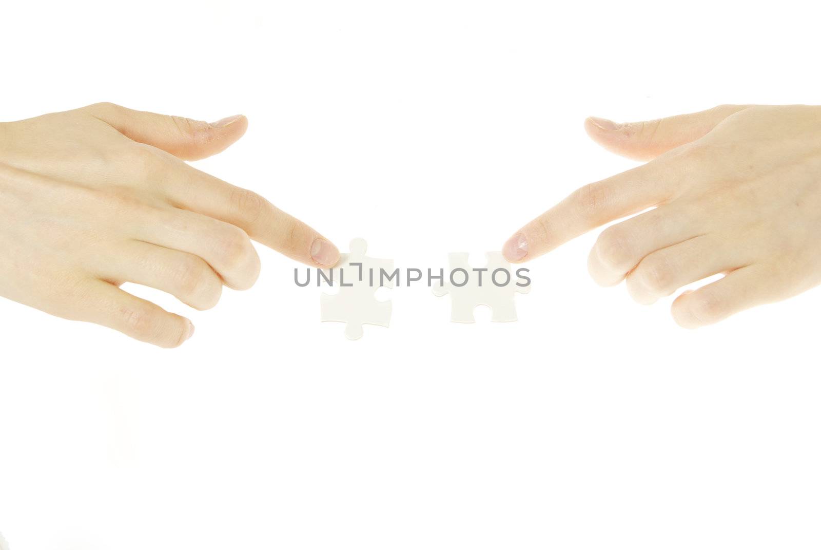  puzzle in hands isolated on white background