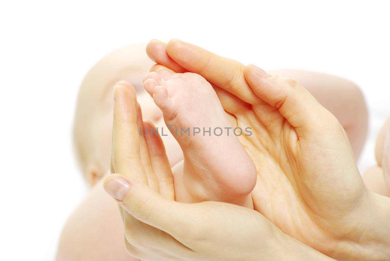 newborn baby feet isolated on white