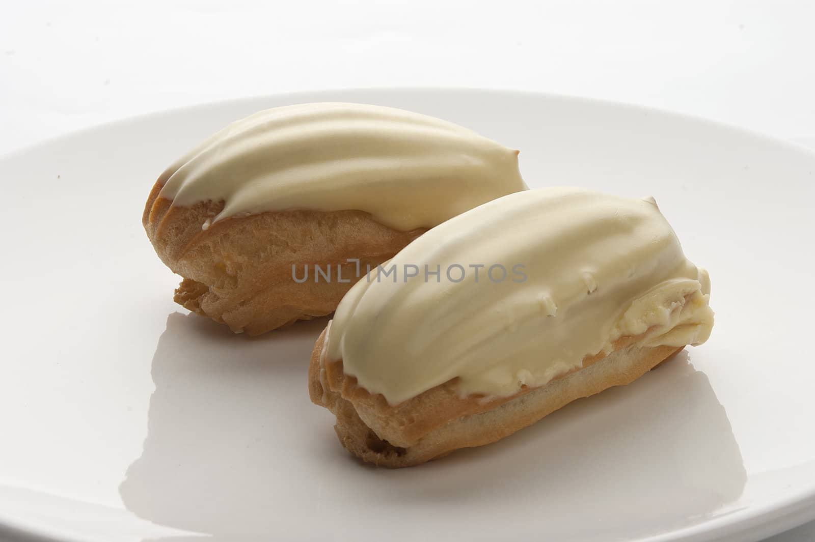 Two cream-filled French pastry on the plate