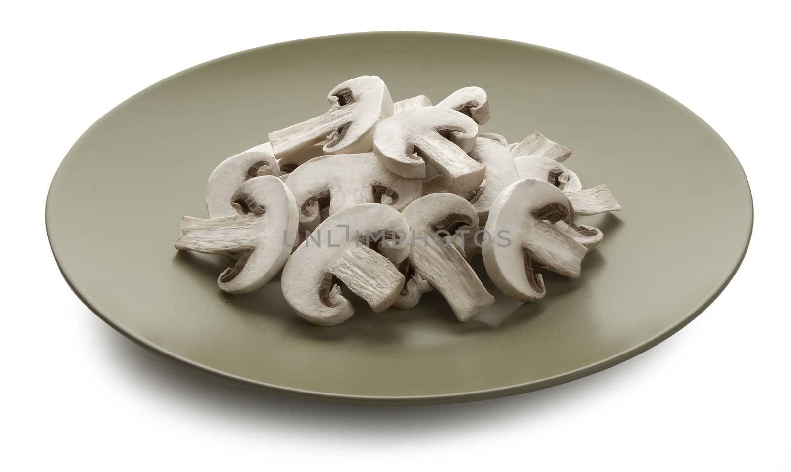 Handful of fresh champignon's slices on the plate