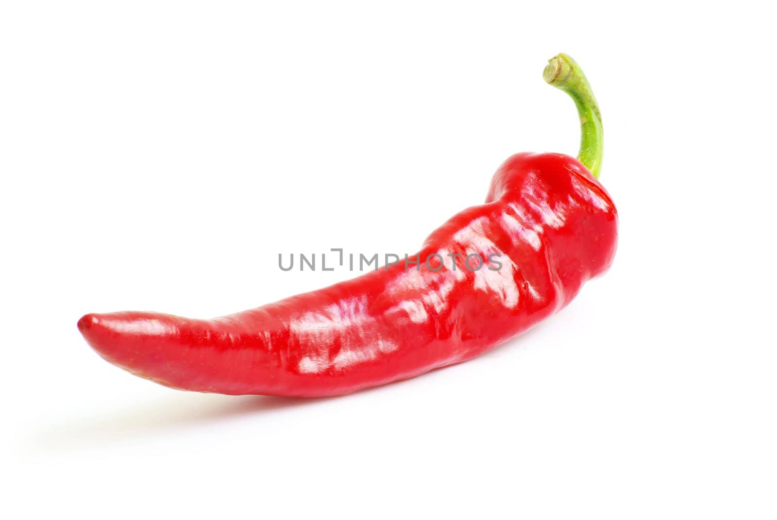 fresh red hot pepper on a white 