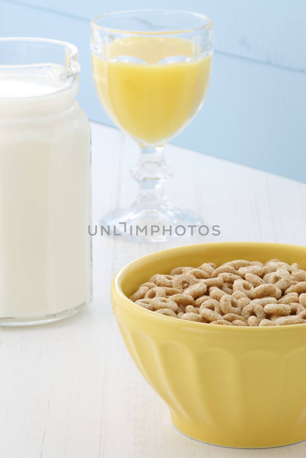 Delicious and nutritious lightly toasted honey, nuts and oats cereal with milk.