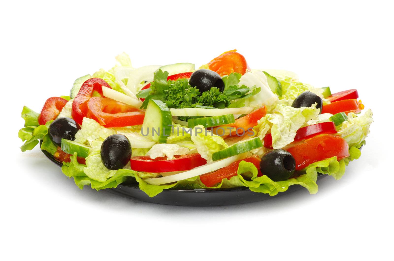  salad in plate on white