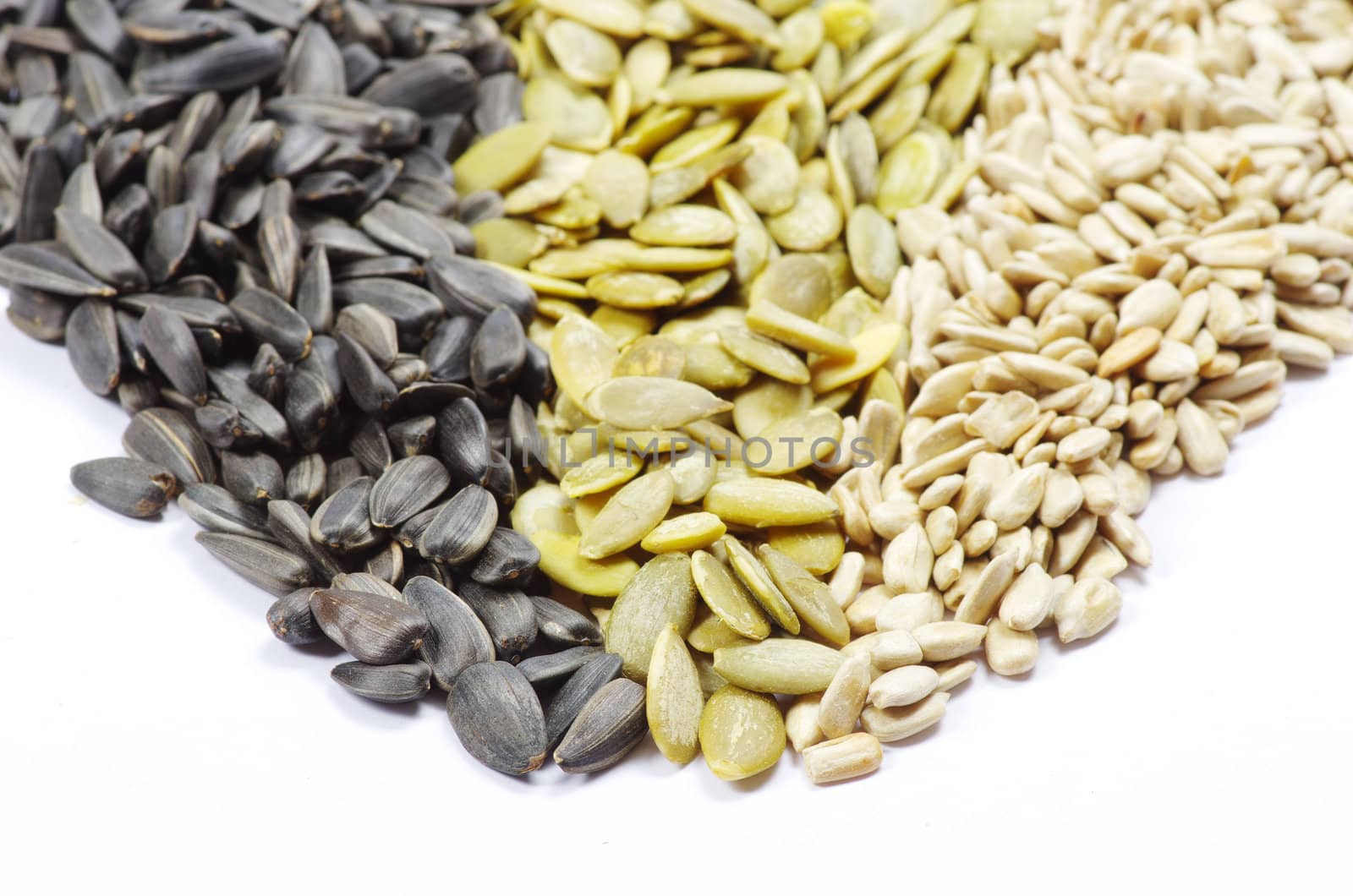 Close up image of sunflower and pumpkin seeds