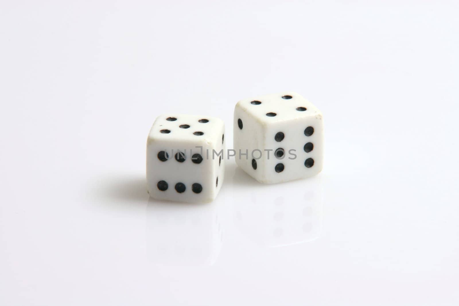 tow six dices on white background toys and leisure items