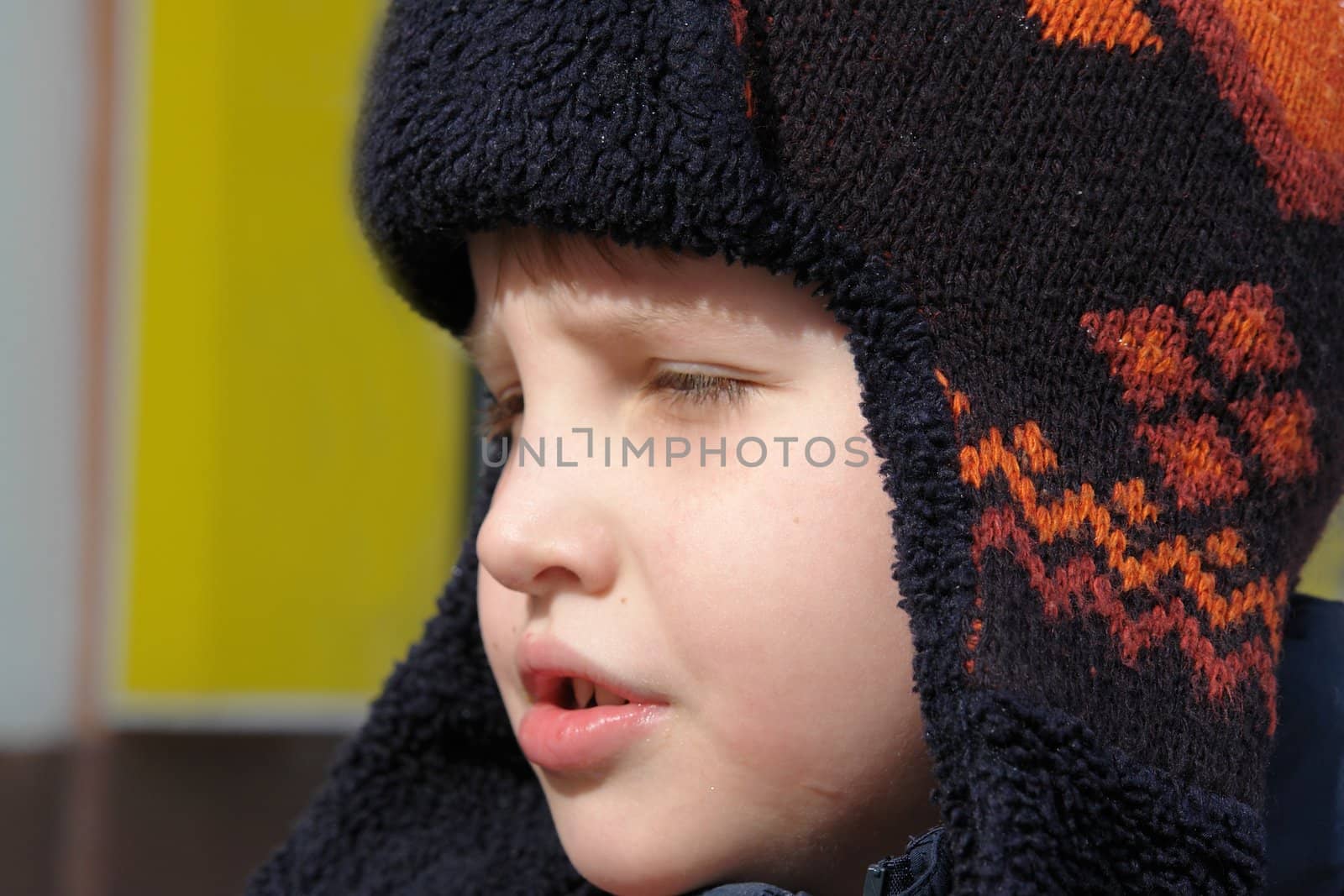 The little boy in a winter cap