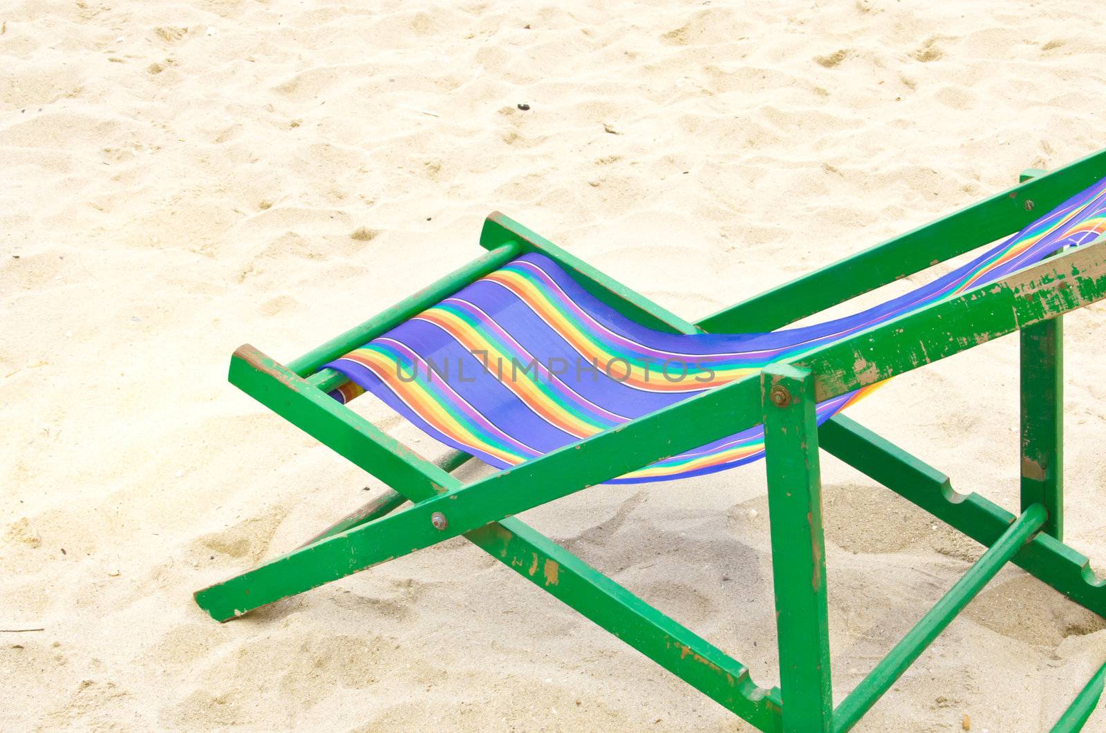 Folding chair  at the beach of the sea.