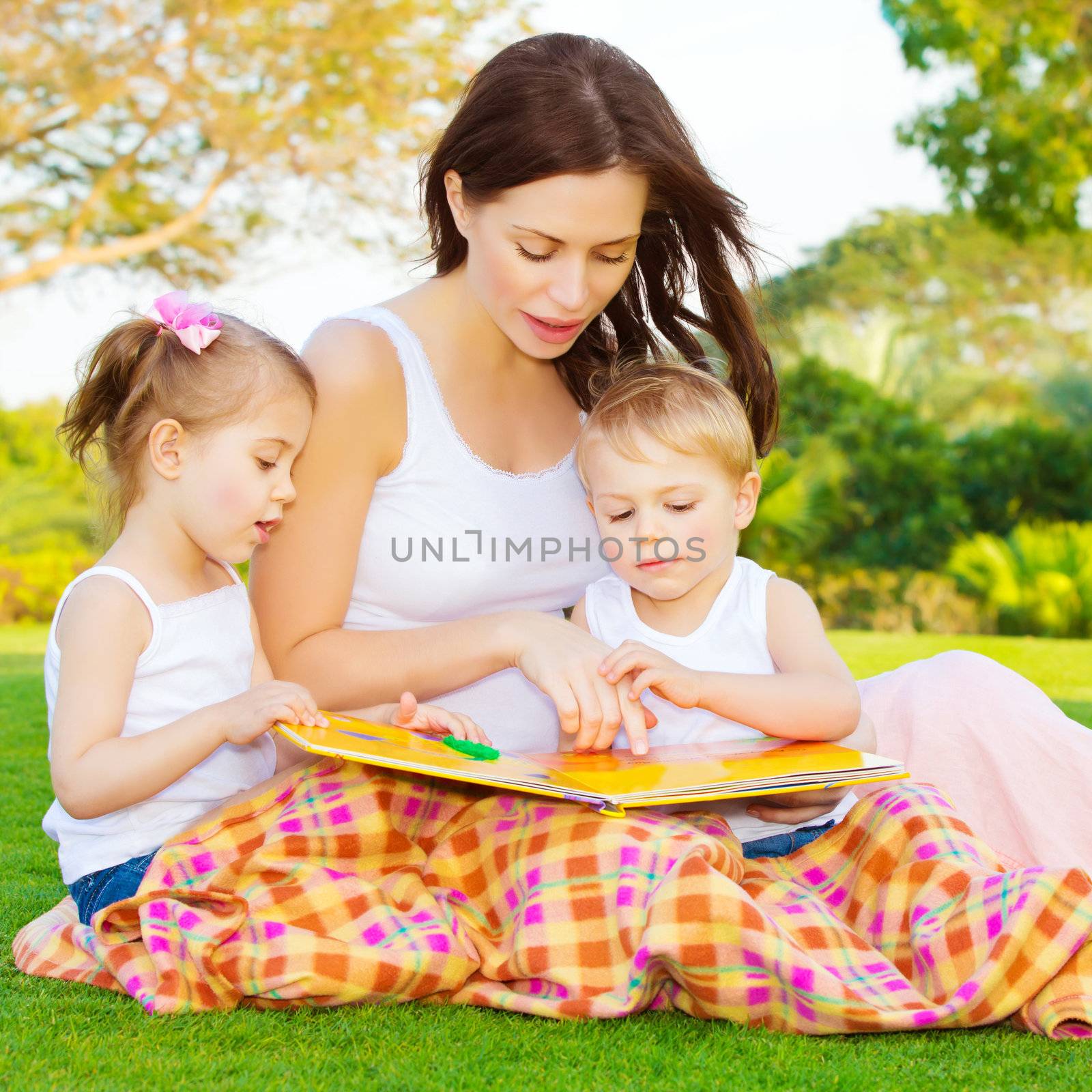 Little kids with mommy read book by Anna_Omelchenko