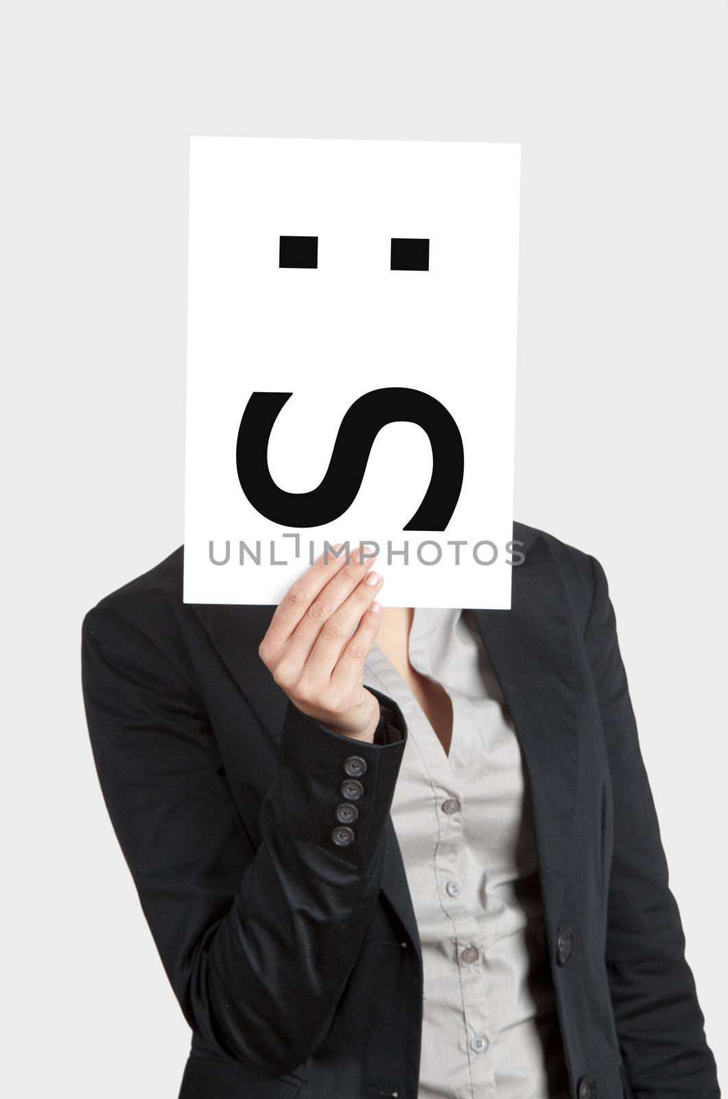 Woman showing a blank paper with a confused emoticon in front of her face