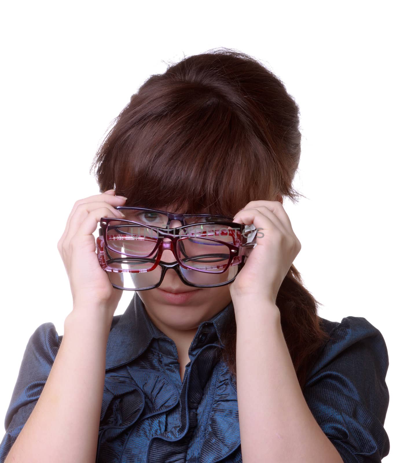 Closeup of an attractive woman holding her eyeglasses over white background