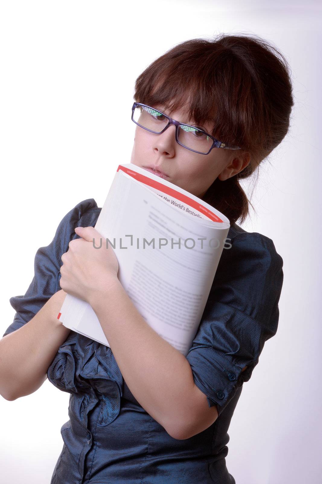 Portrait of young alluring brunette woman, holding book by Discovod