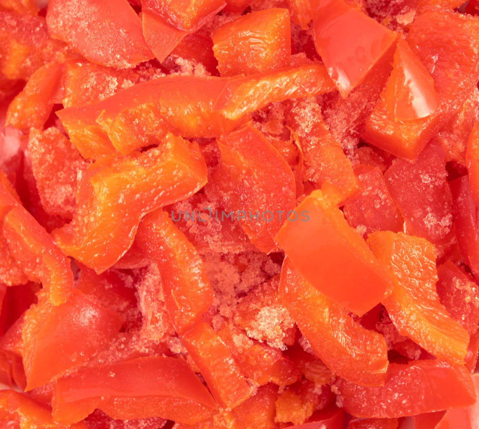 Background.Slices of red bell pepper close-up