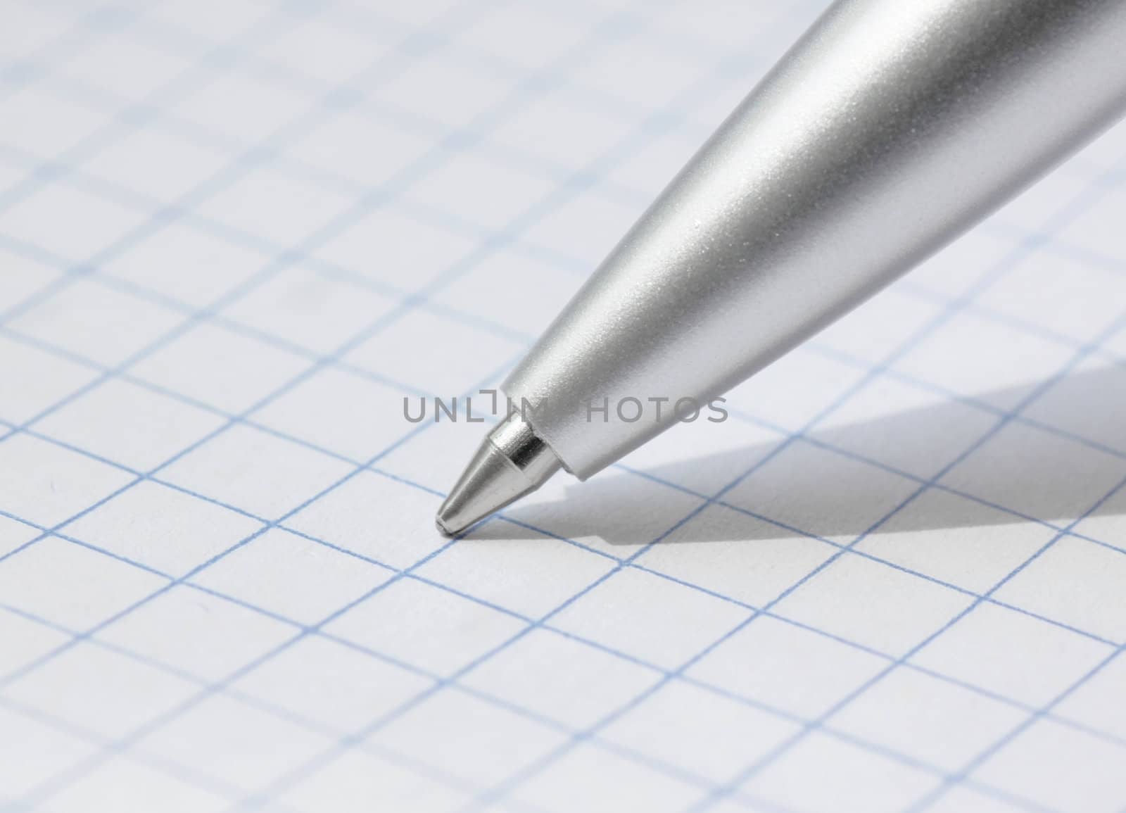 close up of pen at paper