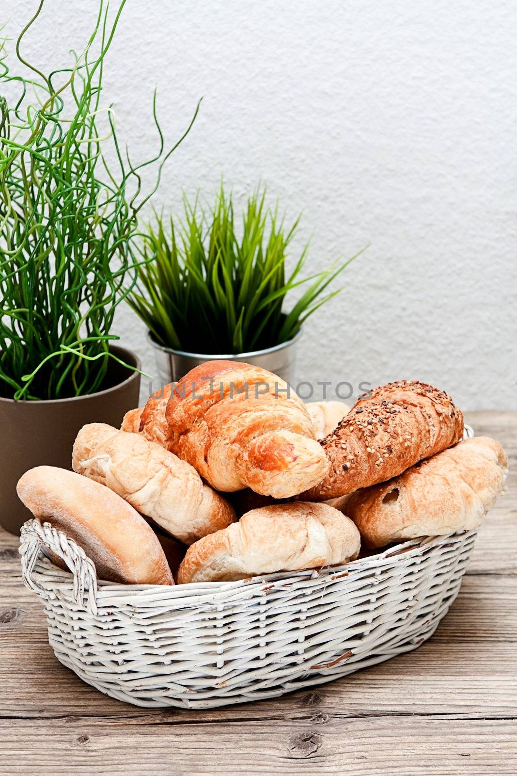 traditional french breakfast in morning on wooden background