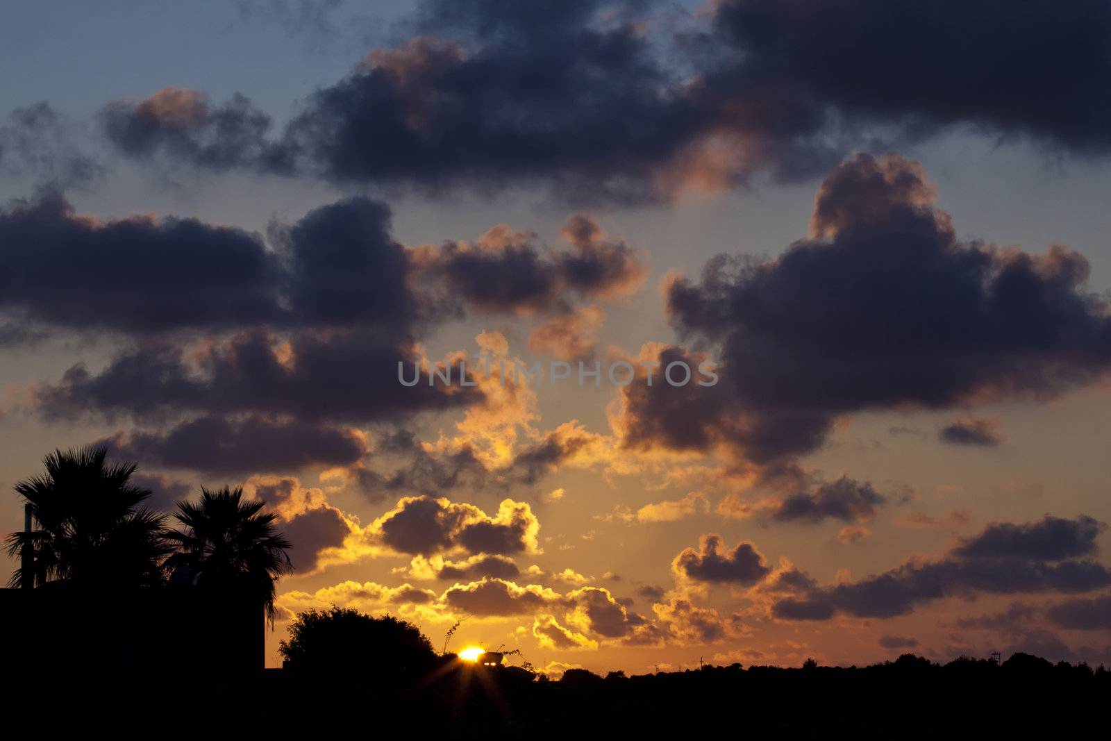 A lightly clouded sky during sunset shot from atop Wardija Hill in Malta; straight out of the camera and unedited