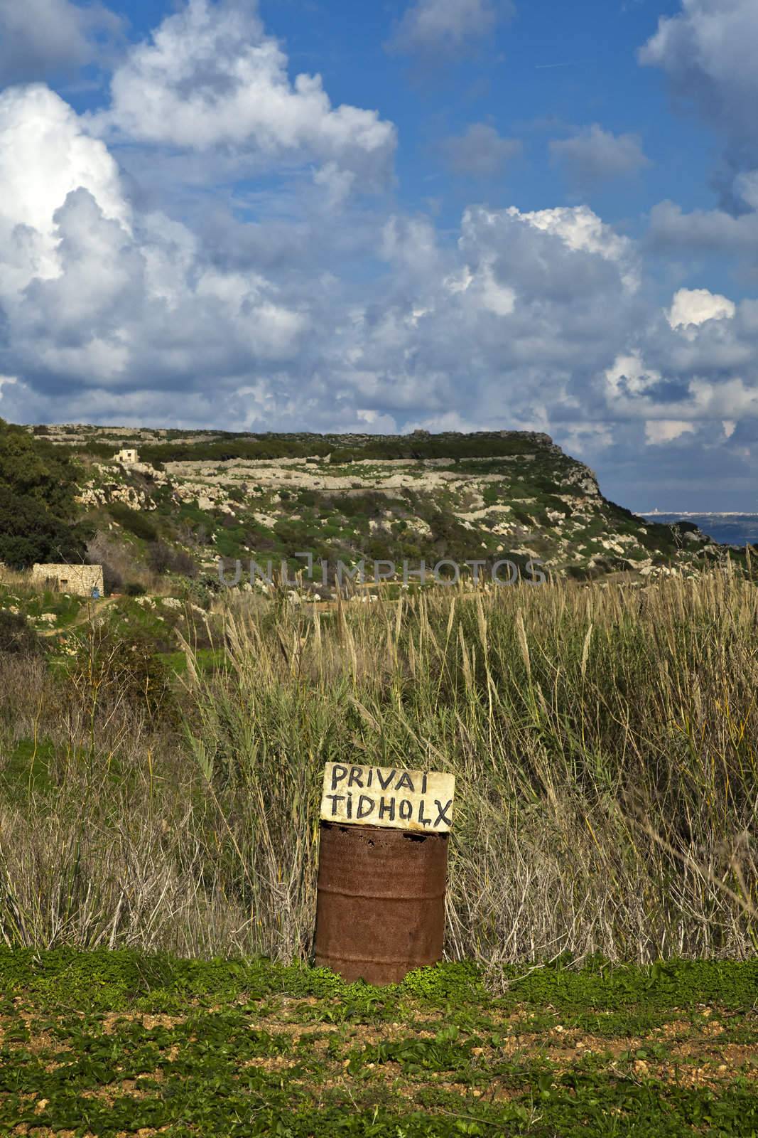 When walking in the countryside i Malta, one is faced with hundred of ad hoc signs saying Private, Do Not Enter, or RTO (short for Riservato in Italian).  Most of these signs are illegally placed, and the land in question most of the times is in fact public land.