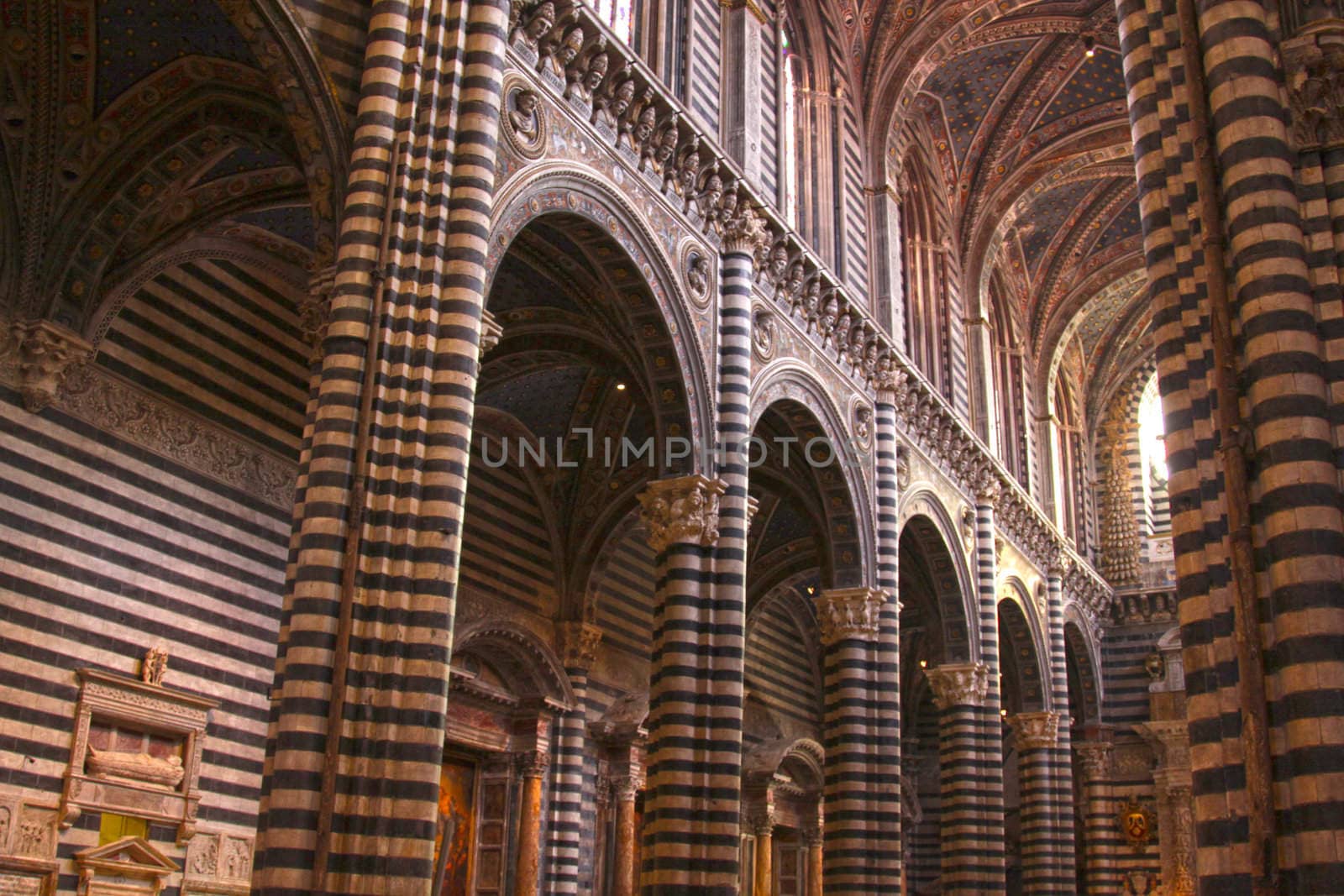 The stunning stripped interior of the cathedral in Siena, Italy.