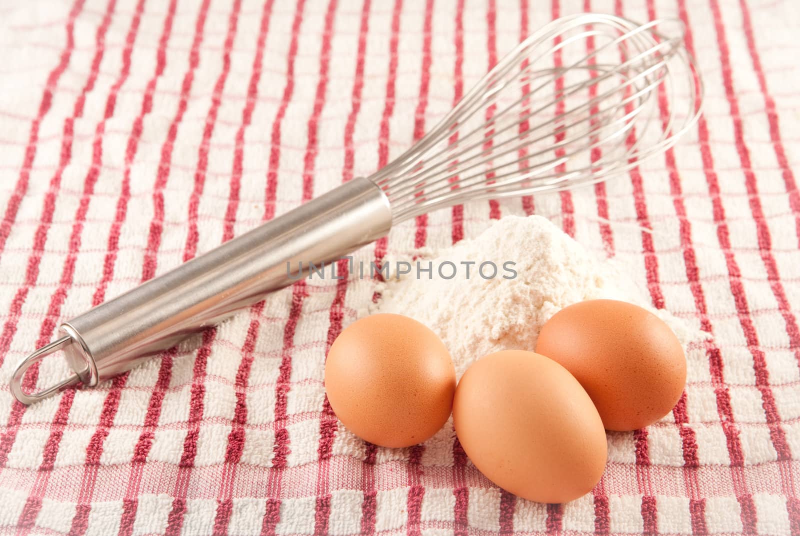 eggs, flour and a whisk