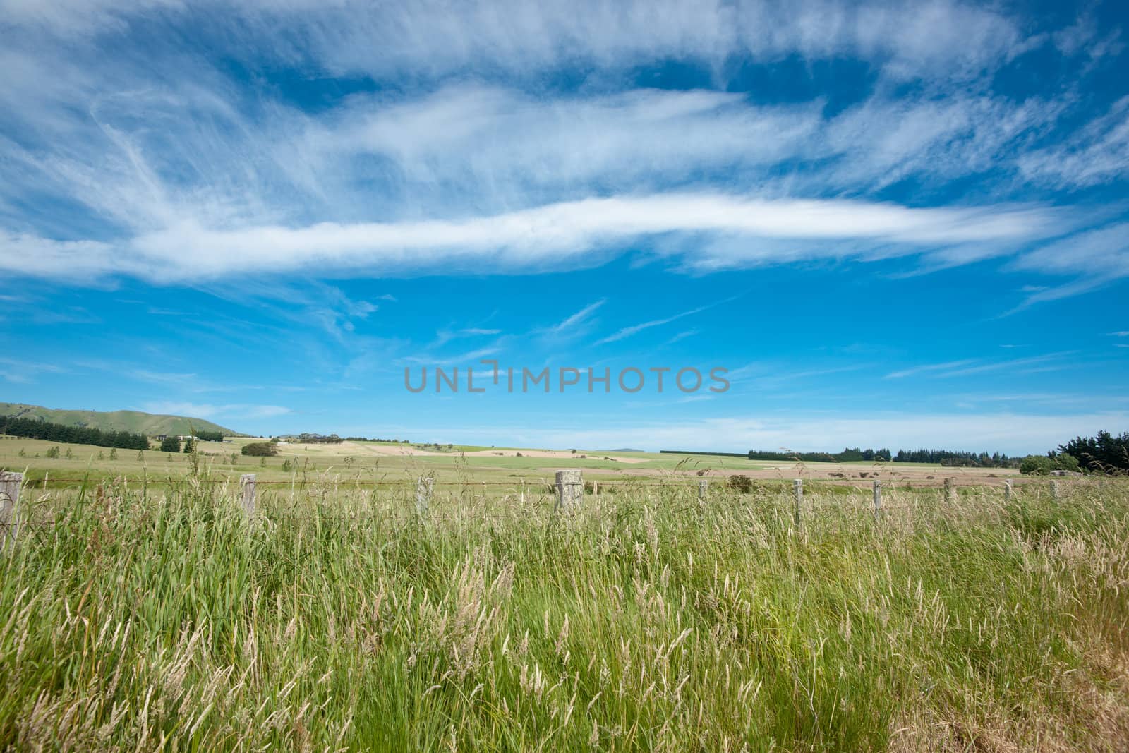 Cloudscape over rural landscape. by brians101