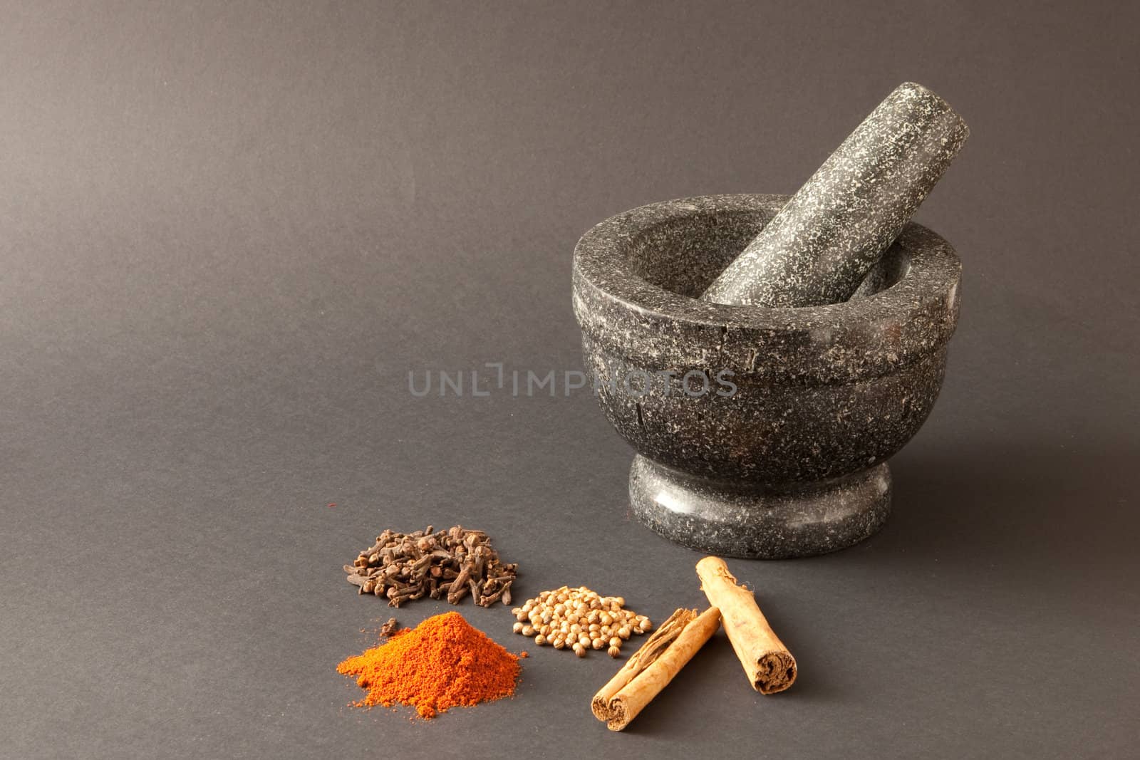 spices on grey background