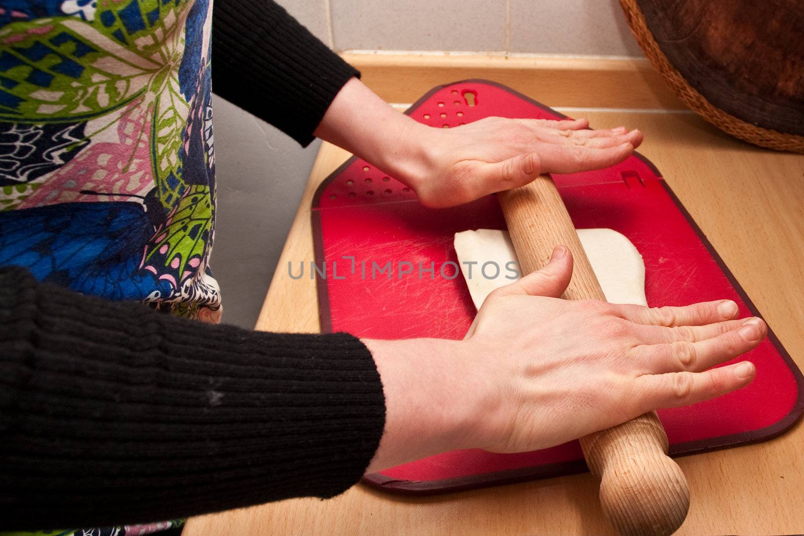hands rolling pastry
