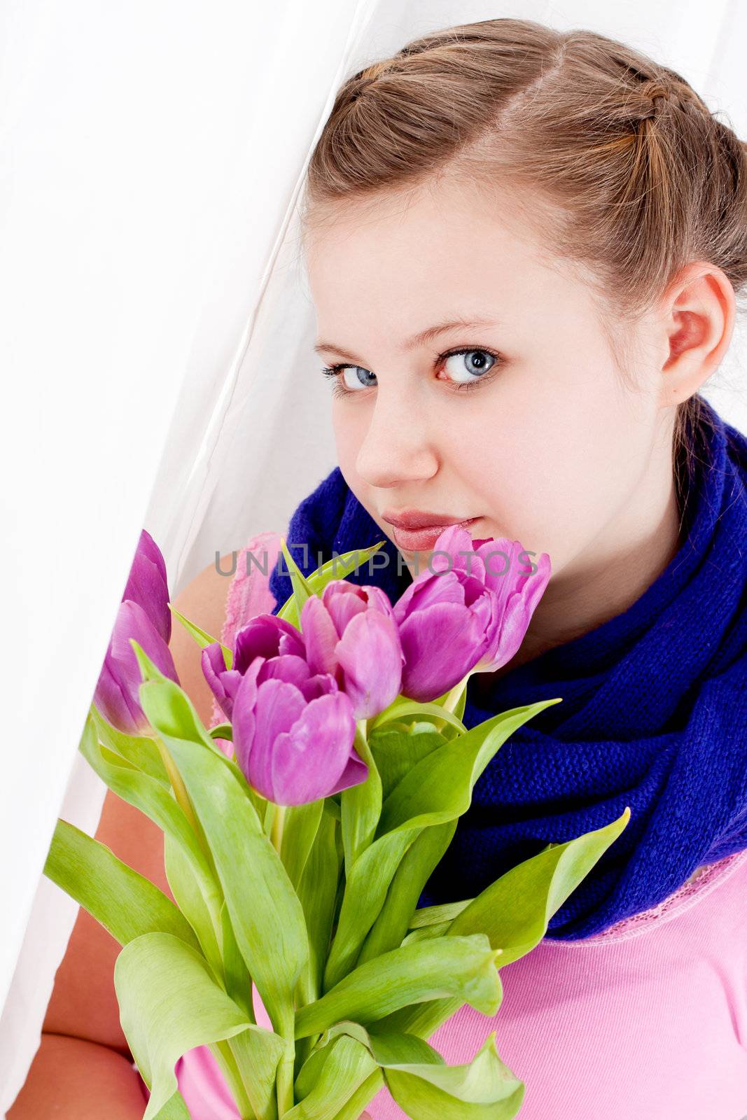 smiling teenager girl with pink tulips bouquet present gift easter mothersday valentine birthday