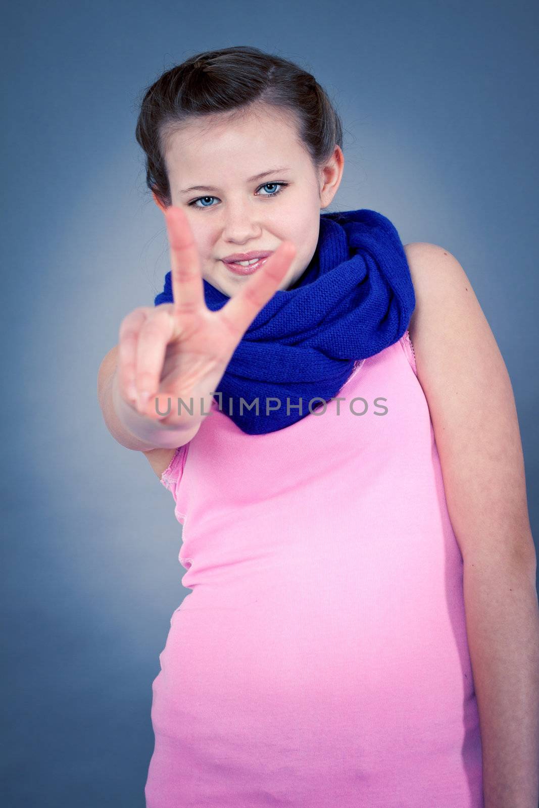 young teenager girl smiling having fun portrait blue scarf