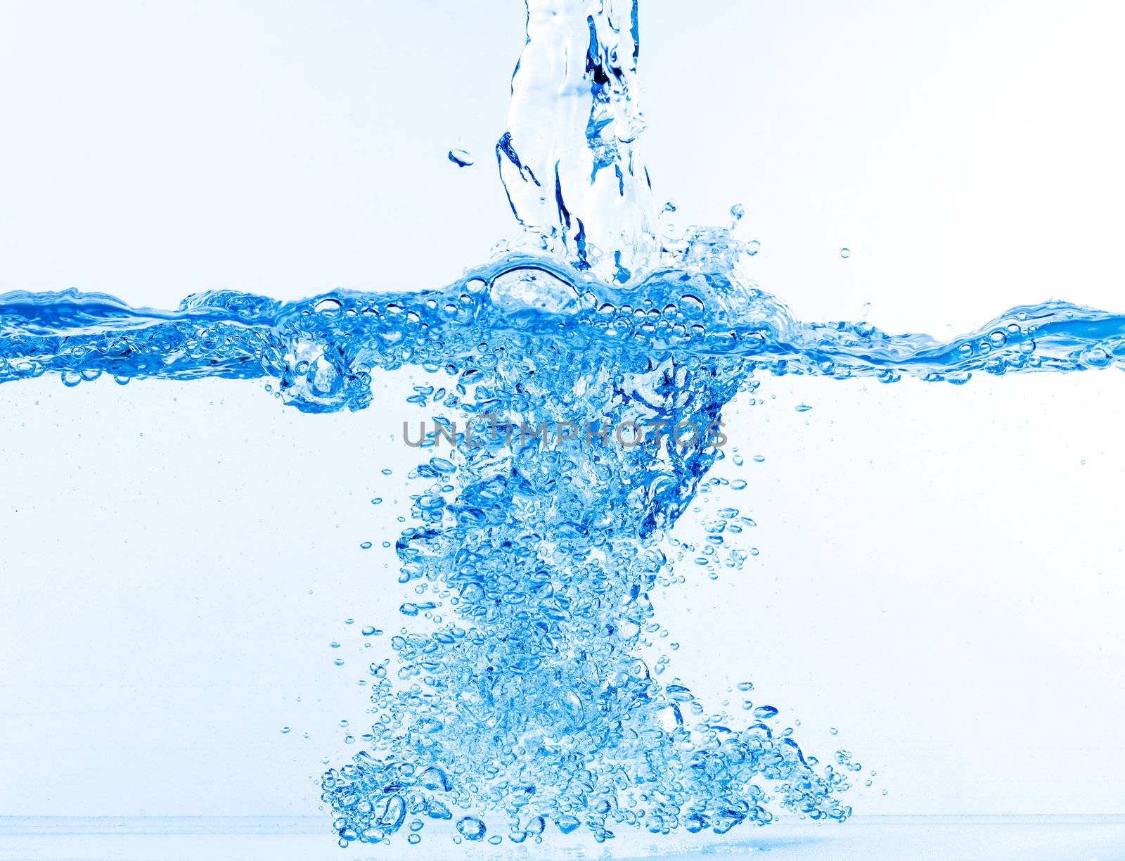 Stream of Water Falling into the Water, closeup