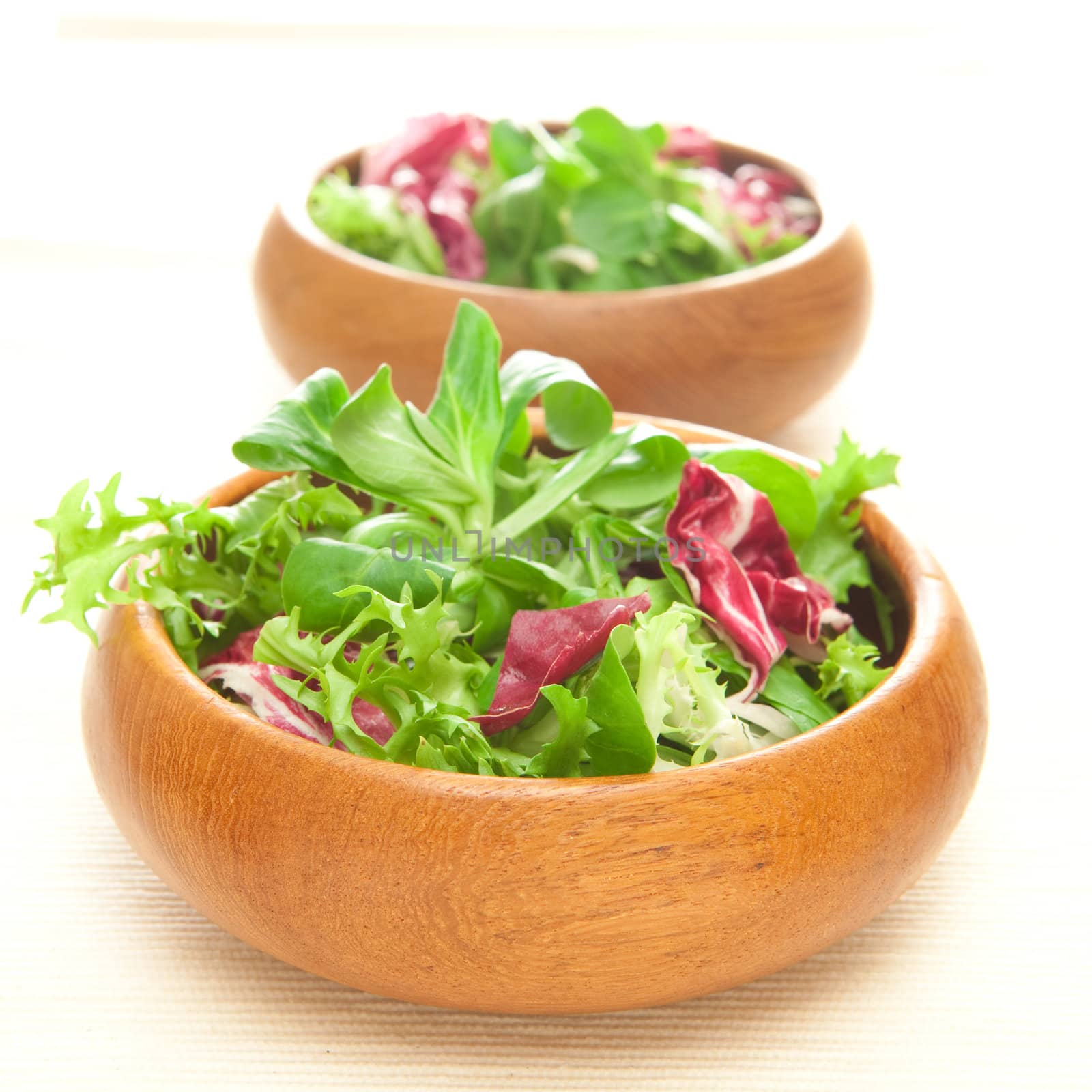 Two bowls of salad
